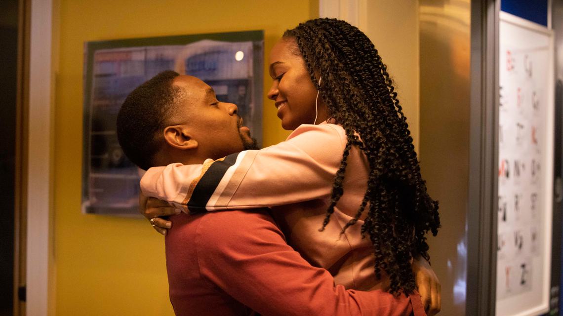 Boxing Day, courtesy of Warner Bros. Two people embracing