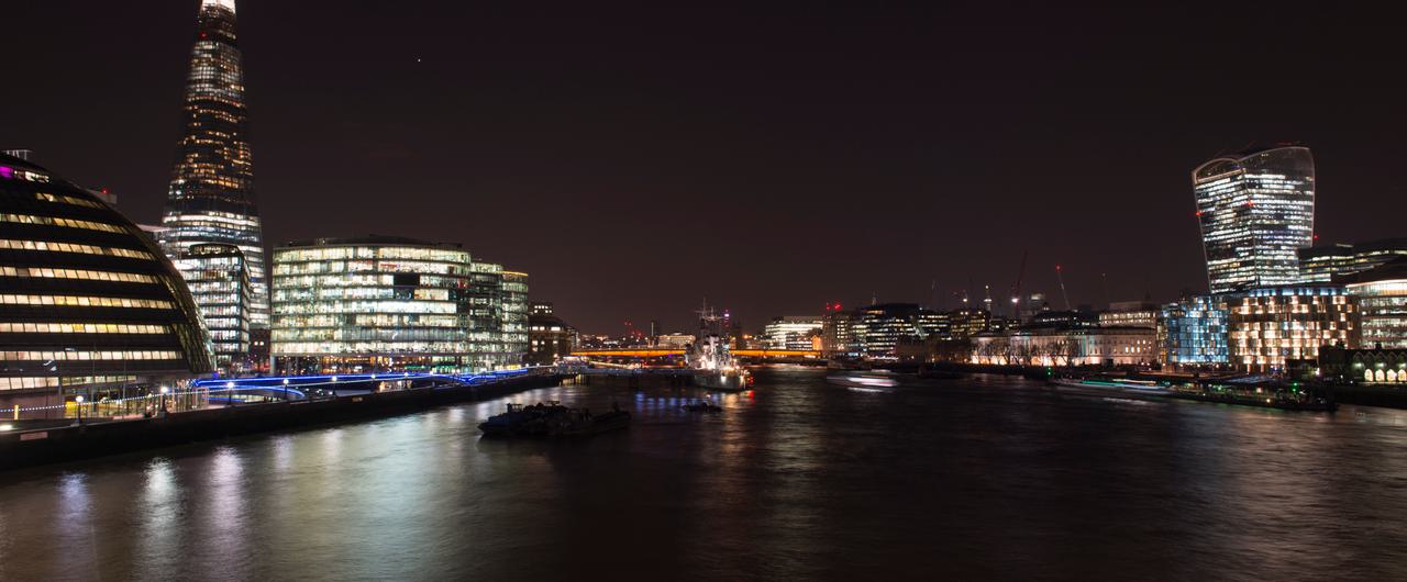 city of London exterior by River Thames at night