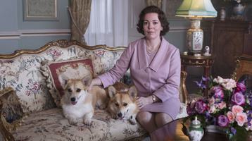 Still of The Crown with Olivia Coleman and two corgis
